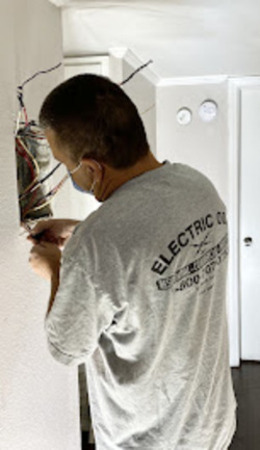 <img src="Electrician installing EV charger in Panorama City home.jpg" alt="Electrician installing EV charger in Panorama City home" />